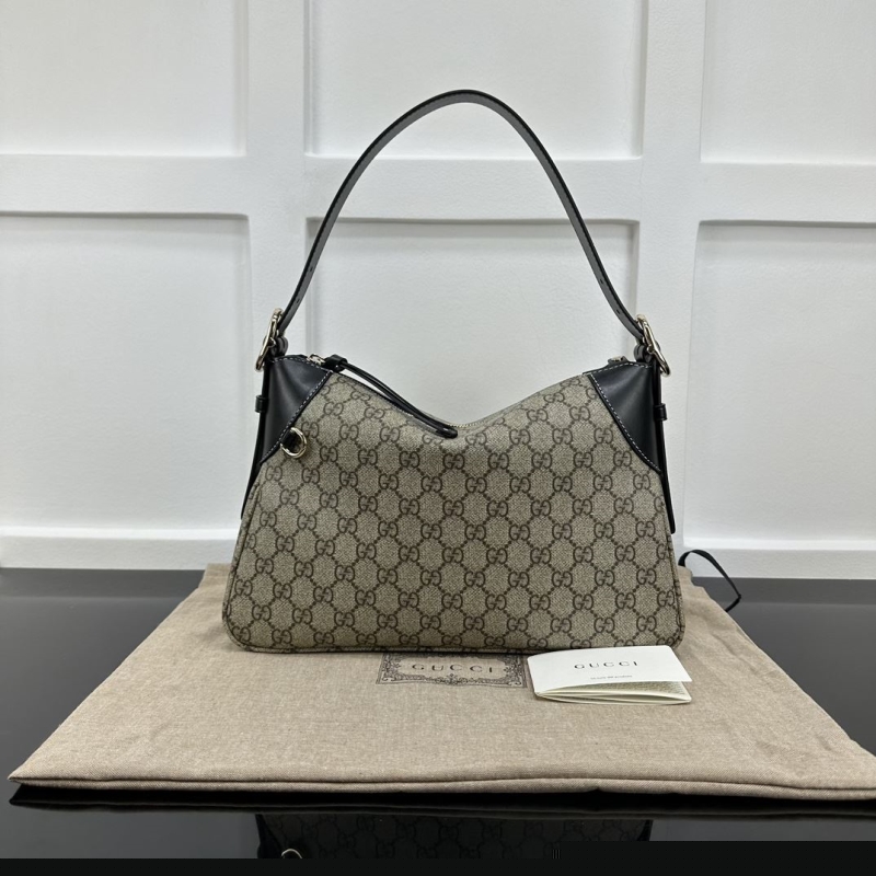 G*u*i top handle bags